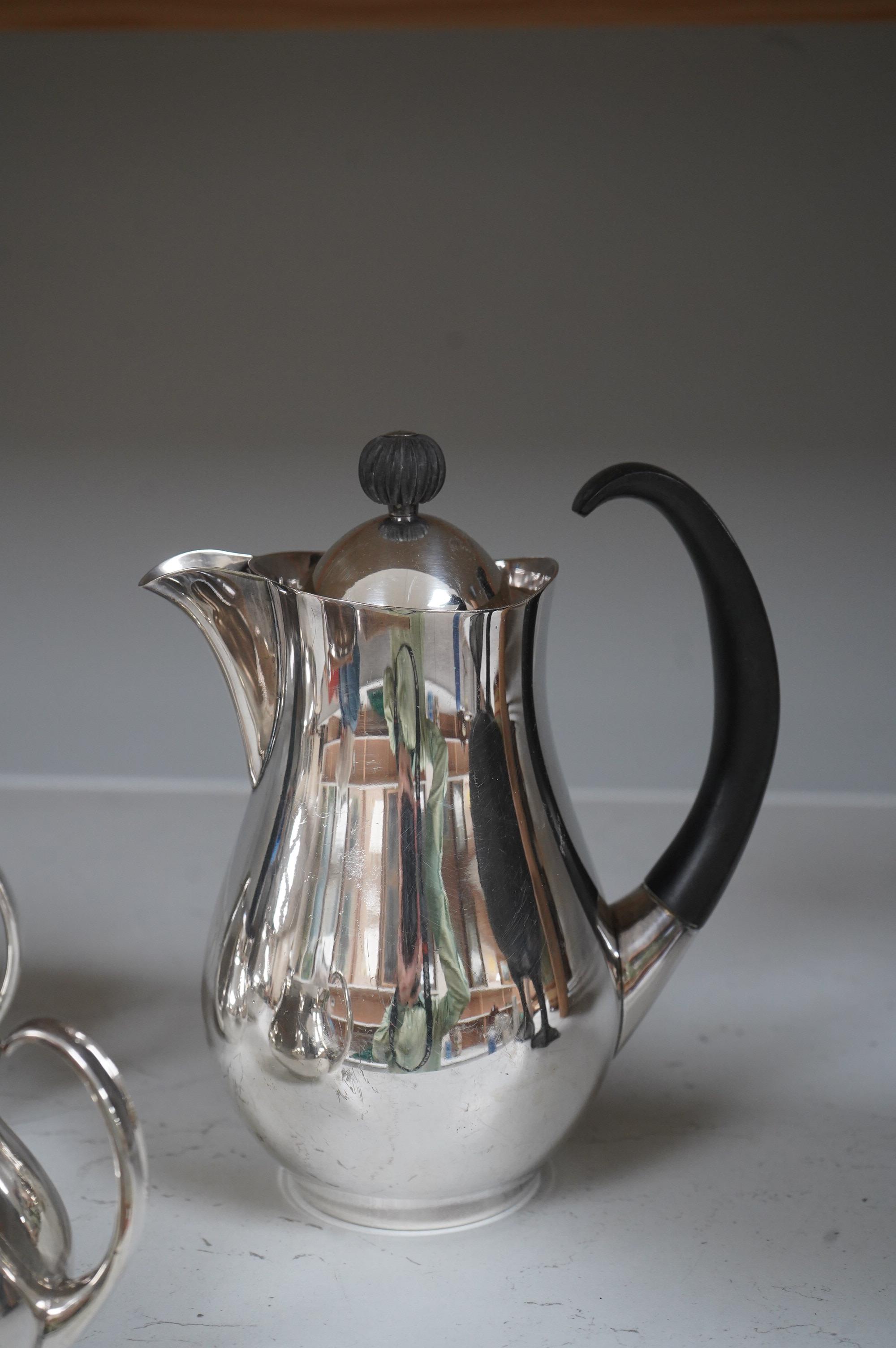 Eric Clements (1925-2019) a four piece plated tea set, c.1960, Embassy plate by M&W England, water jug and cover, 19.5cm high